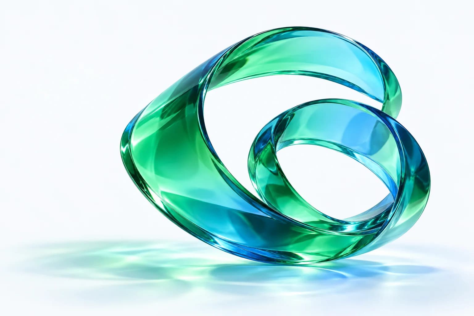 A sculptural ribbon of green and blue glass, curved into a balanced form